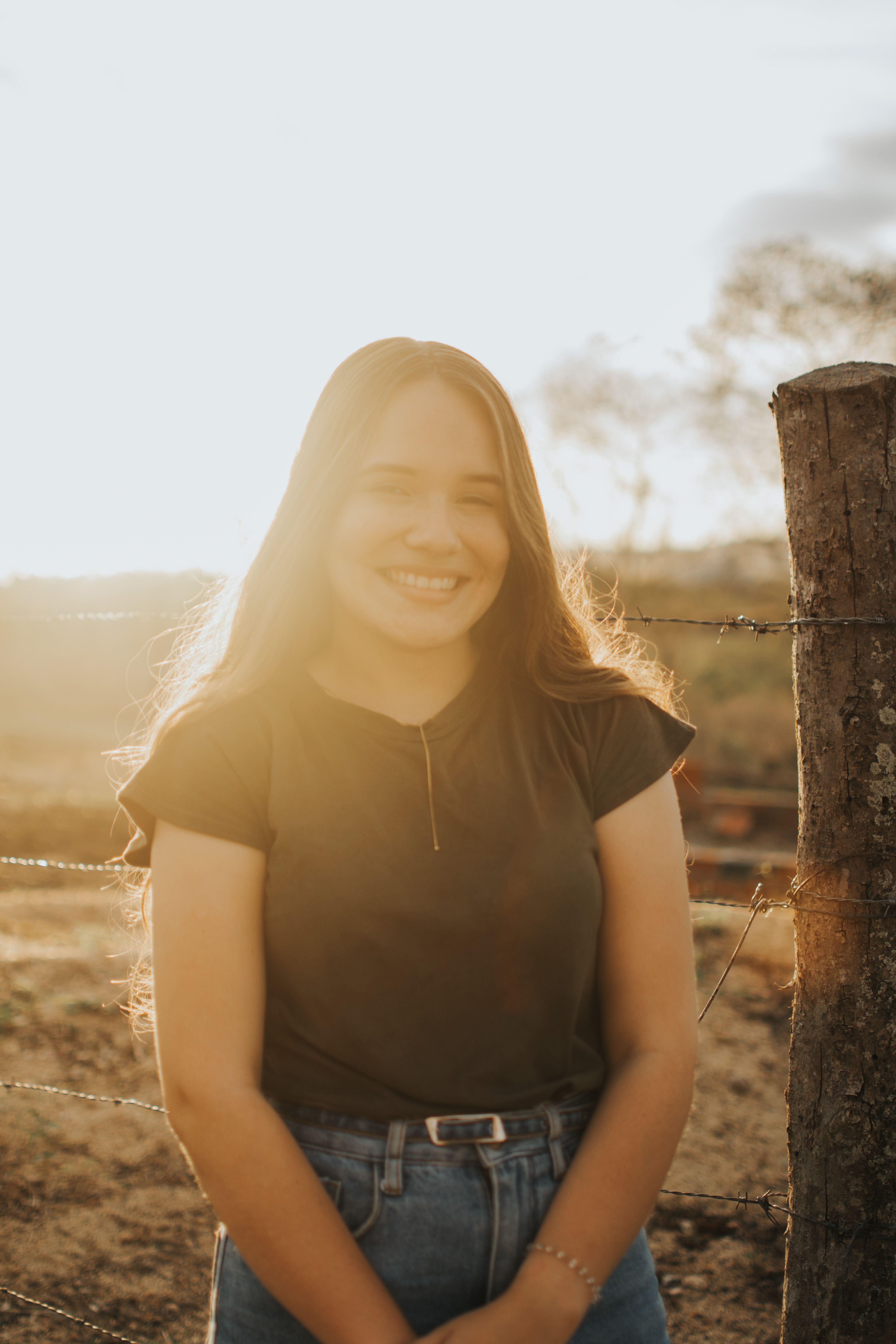 Smiling Woman at Sunset · Free Stock Photo