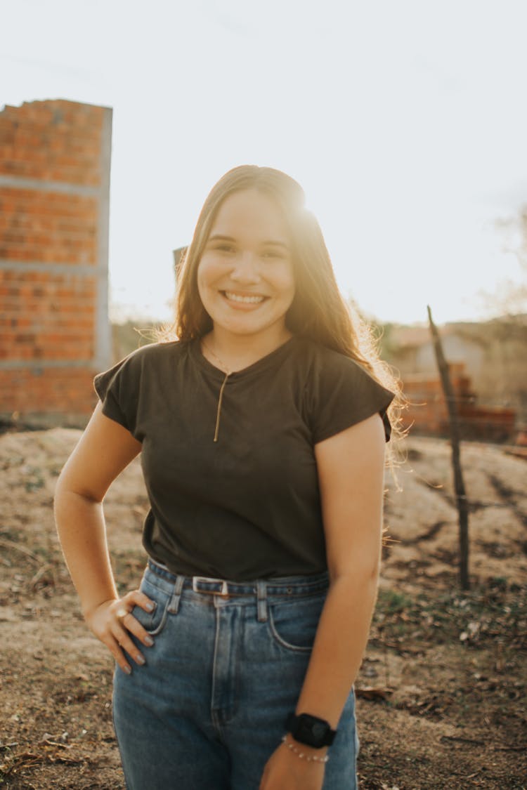 Portrait Of Smiling Woman At Sunset