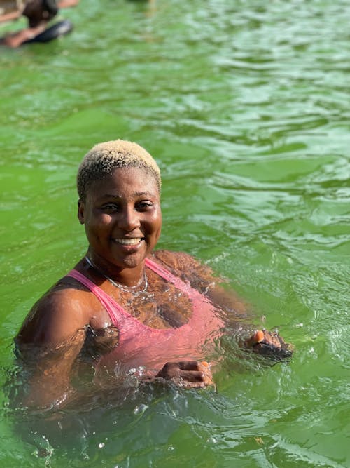 Woman Swimming and Smiling 