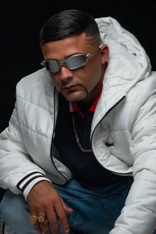 Man in White Jacket and Sunglasses