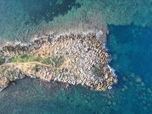 Aerial Photography of Sea and an Island 