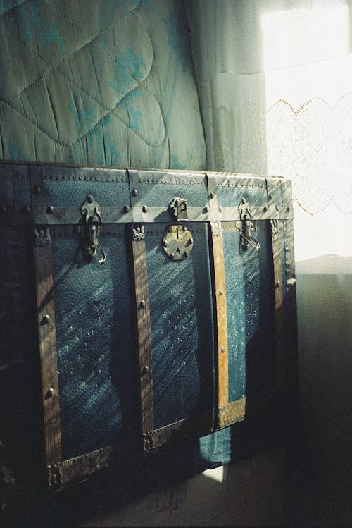 Close-up of a Vintage Container Standing by the Window in a Room 