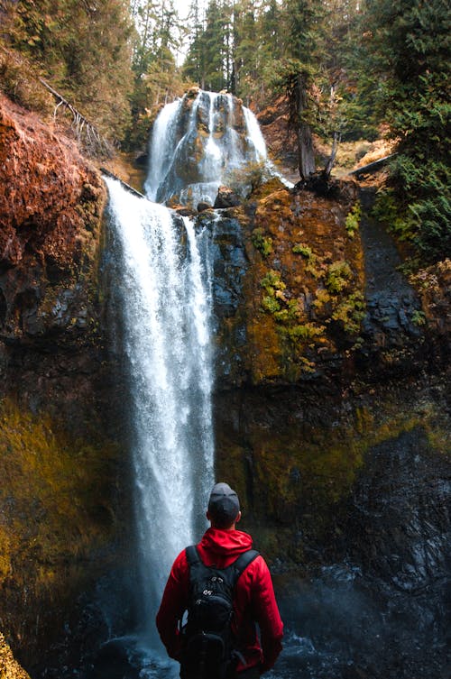 Free Person Looking At Waterfalls Stock Photo