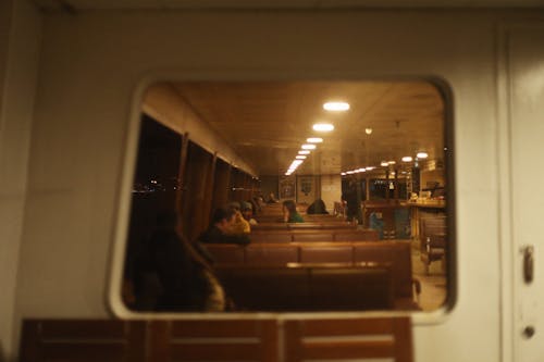 Train Interior Reflected in Window