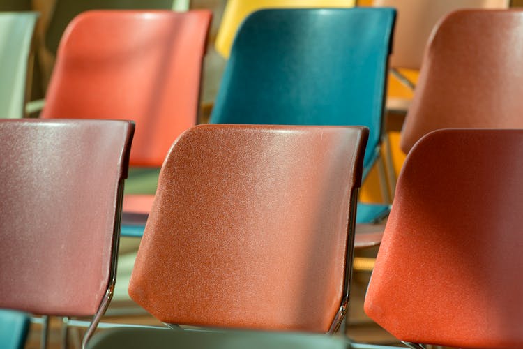 Close-up Of Colorful Plastic Folding Chairs 