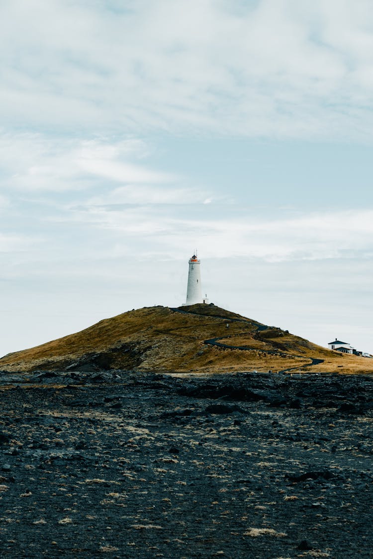 Lighthouse On Hill On Coast