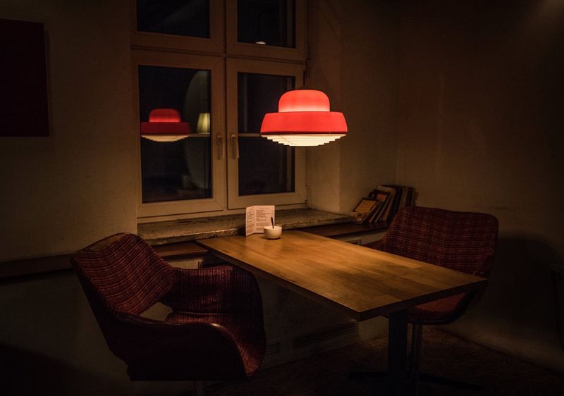 Warm, dimly lit bar and dining seating at Kvevri