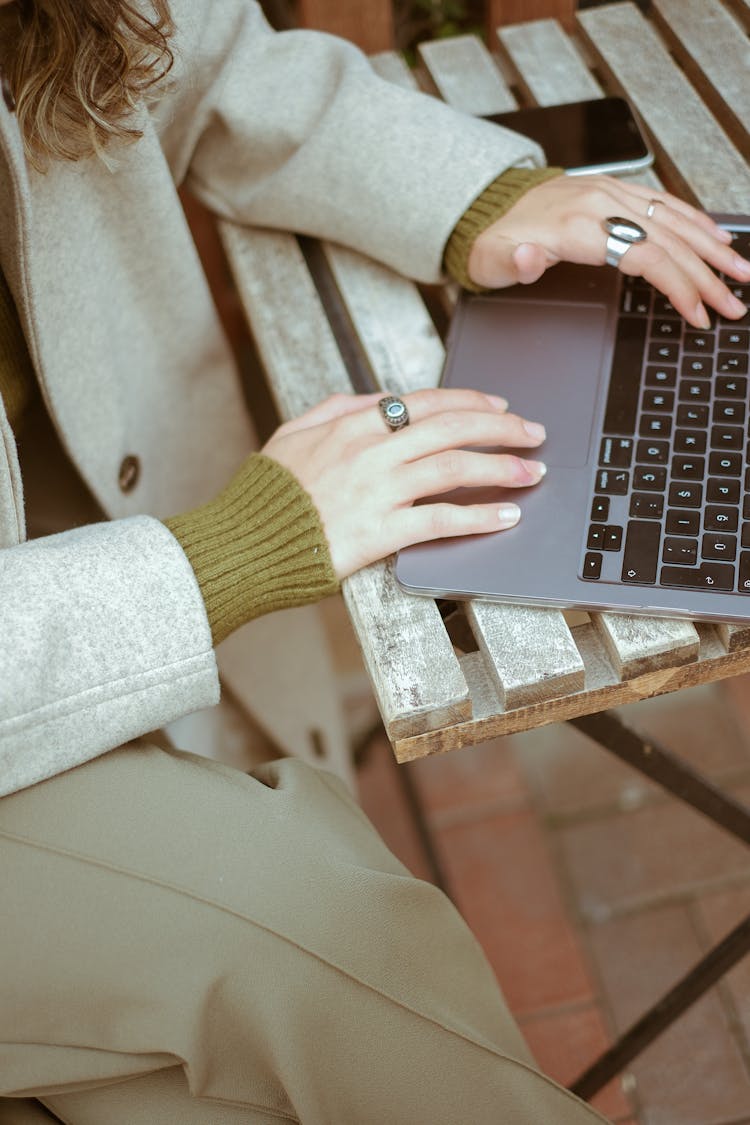 Woman Working Outdoor On Laptop