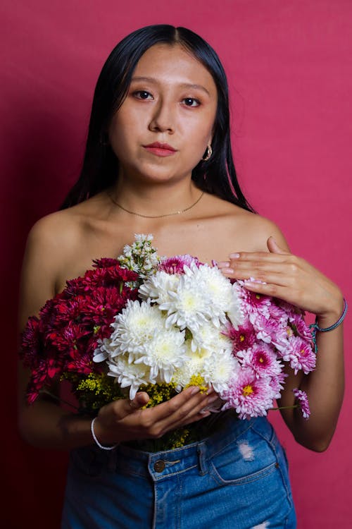 A Woman Holding a Bouquet 