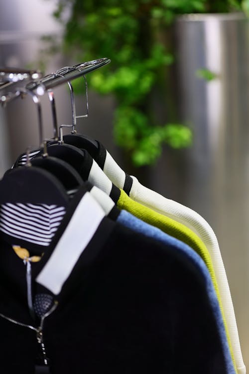 Close up of Clothes on Coat Hangers