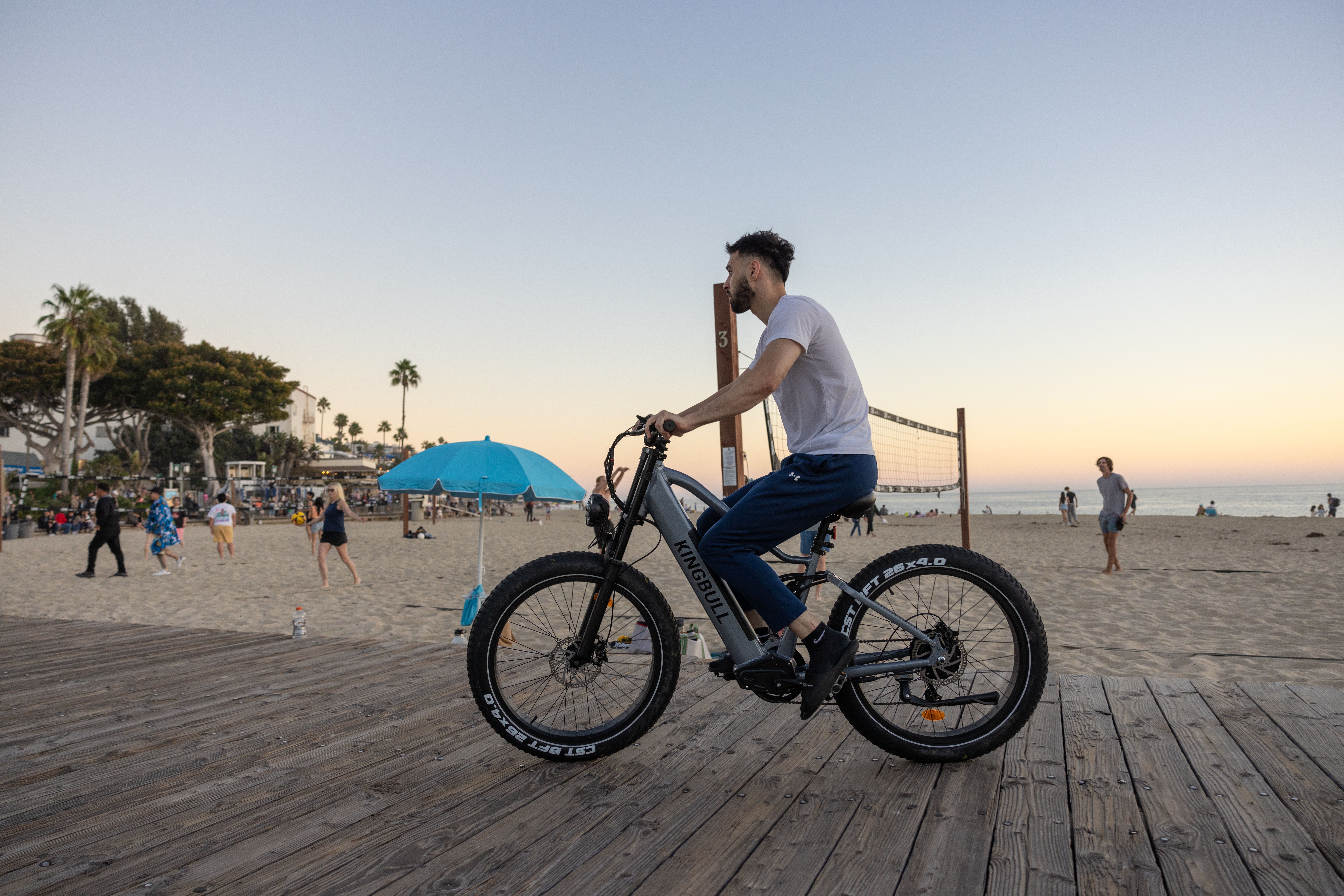 Pacific beach boardwalk cyclists