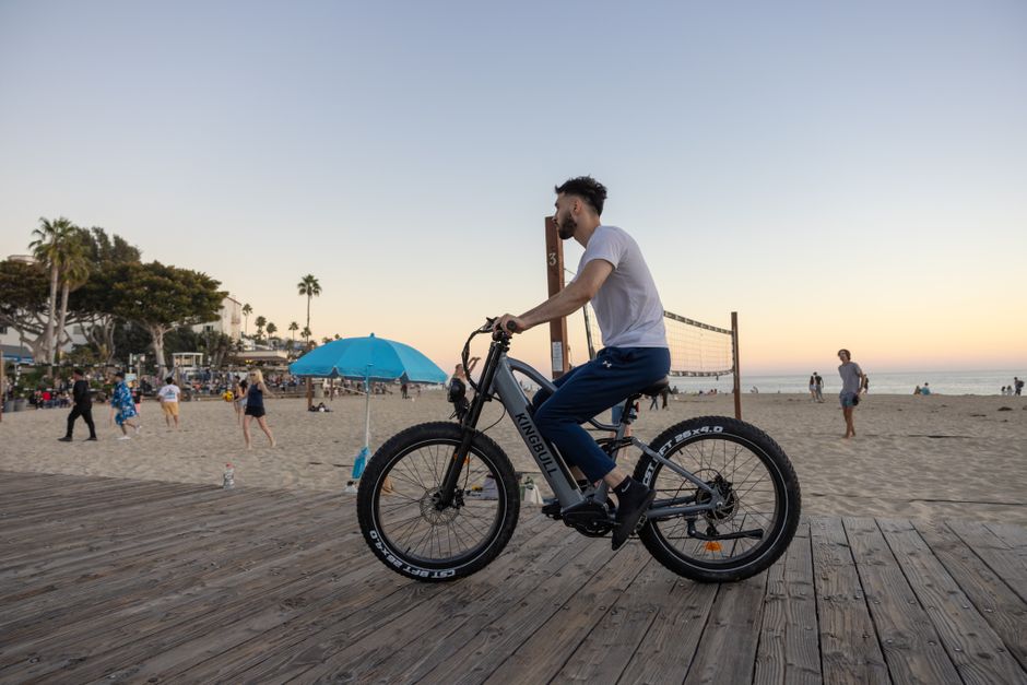 Pacific beach boardwalk cyclists