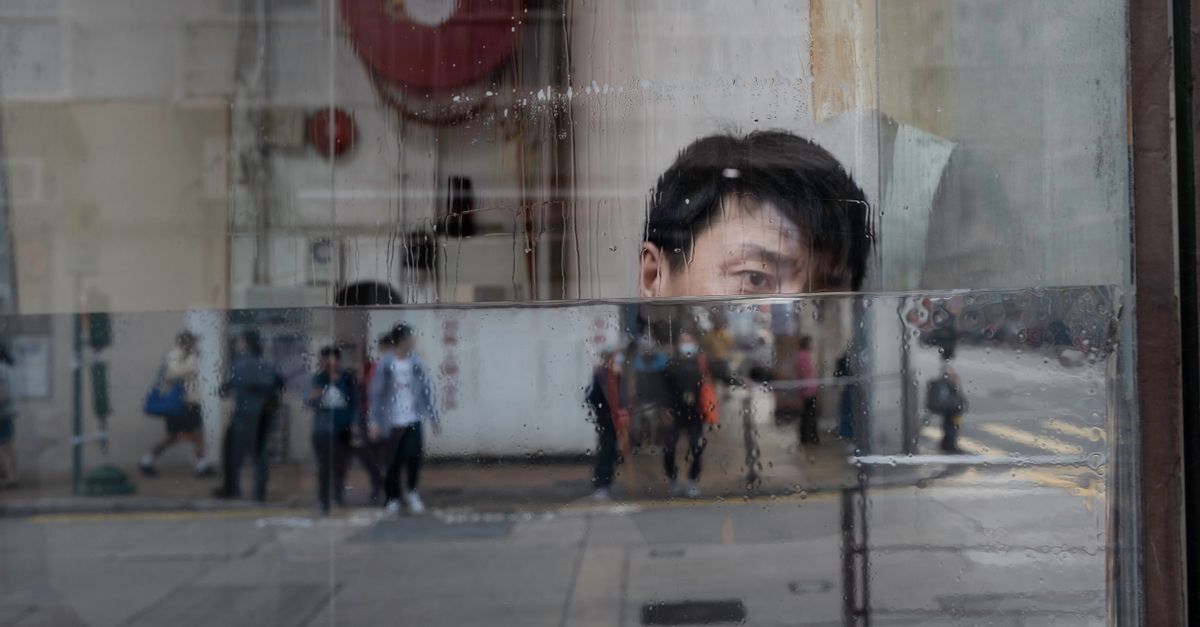 Reflection of a Person in a Window · Free Stock Photo