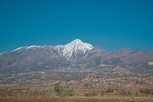 Majestic mountains in Düziçi, Osmaniye under a clear blue sky, offering breathtaking scenic beauty.