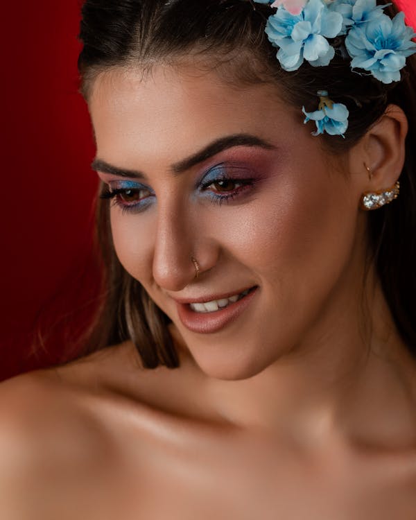 Portrait of Woman Wearing Makeup and Flowers in Hair