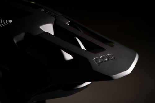 Free Detailed shot of a POC cycling helmet showcasing design and branding. Stock Photo