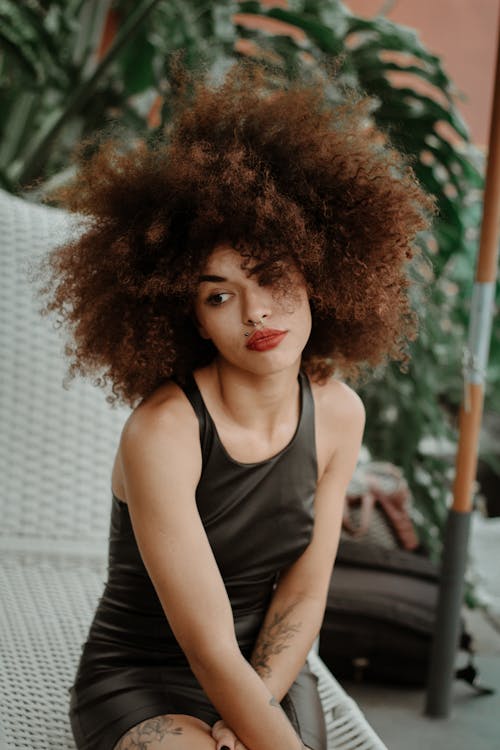 Free Selective Focus Photo of Woman Wearing Black Tank Top Stock Photo