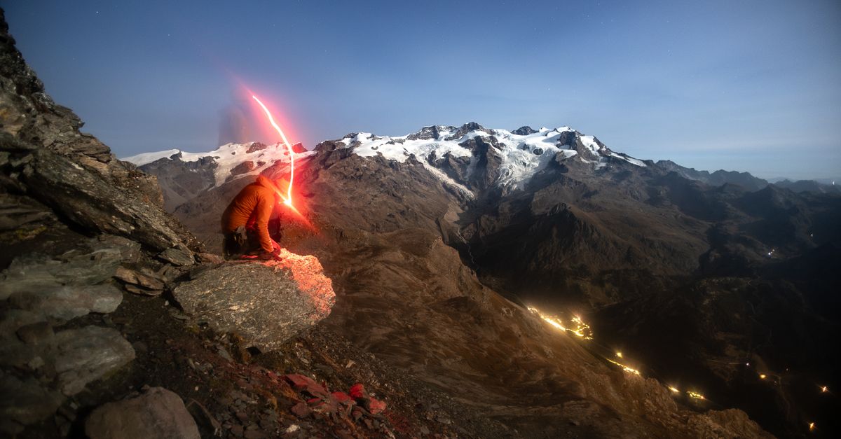 Illustration of a person looking at a huge mountain labeled