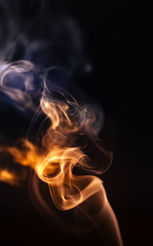 Free Captivating image of swirling smoke and flames with a magical and energetic feel. Stock Photo