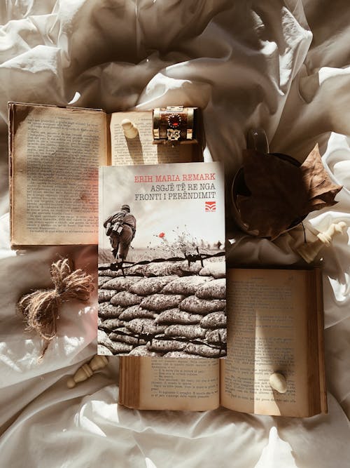 Books Coffee and Leaves on Bed 