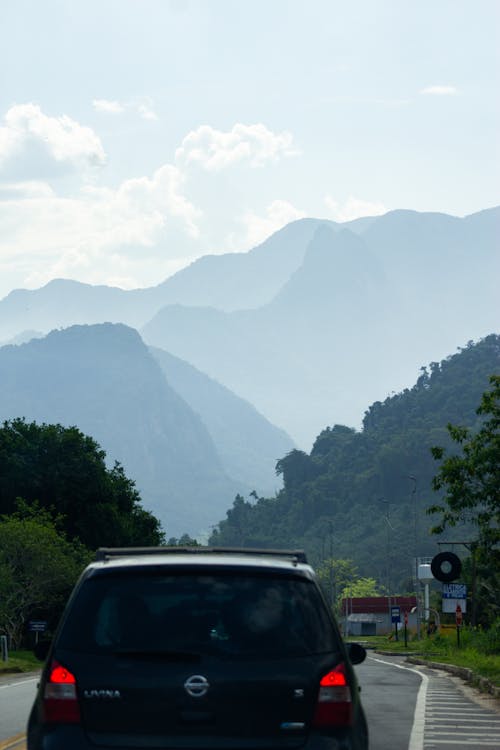Car Running in Mountains