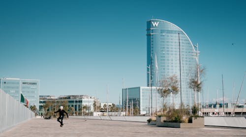 Person Skating in front of W Hotel in Barcelona, Spain