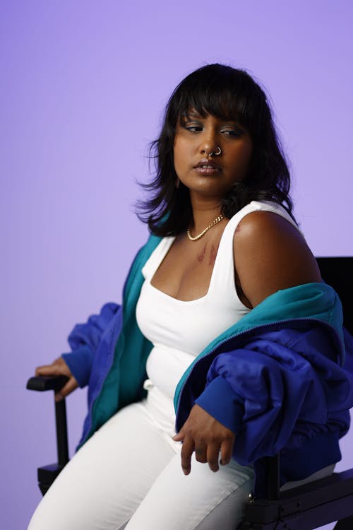 Portrait of African Woman Posing on Chair 