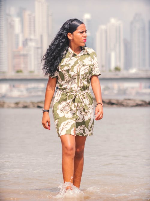 Woman Wearing Floral Dress on a Beach 