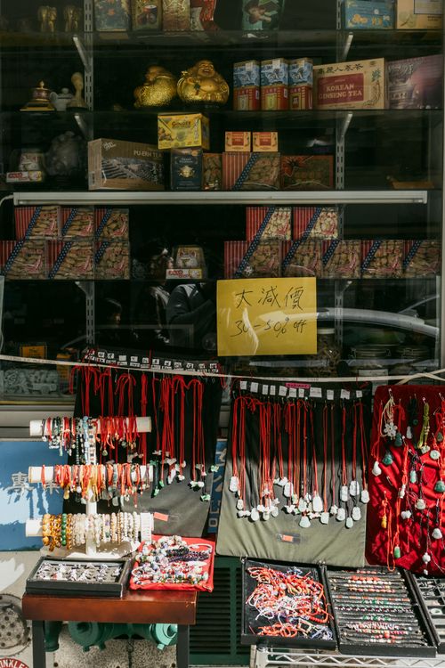 Free Vibrant jewelry display in New York shop window showcasing beads and necklaces. Stock Photo