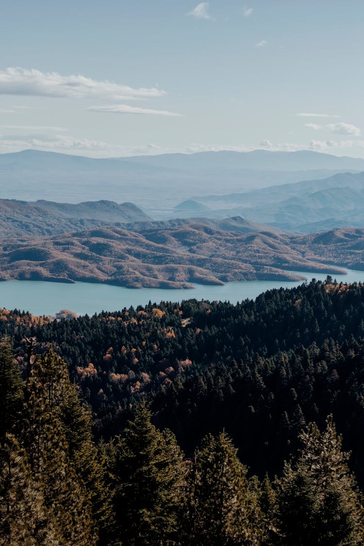 River Among Hills And Mountains