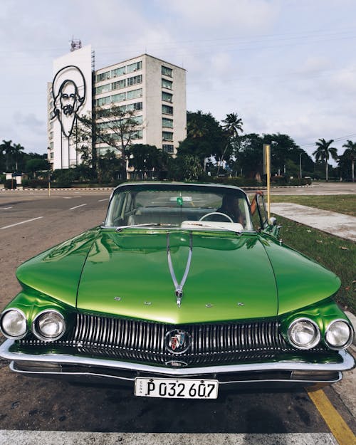 Green Vintage Car on a Street