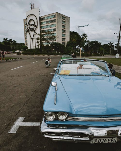 Classic DeSoto Fireflite Convertible Near the Centro Fidel Castro Ruz building in Havana