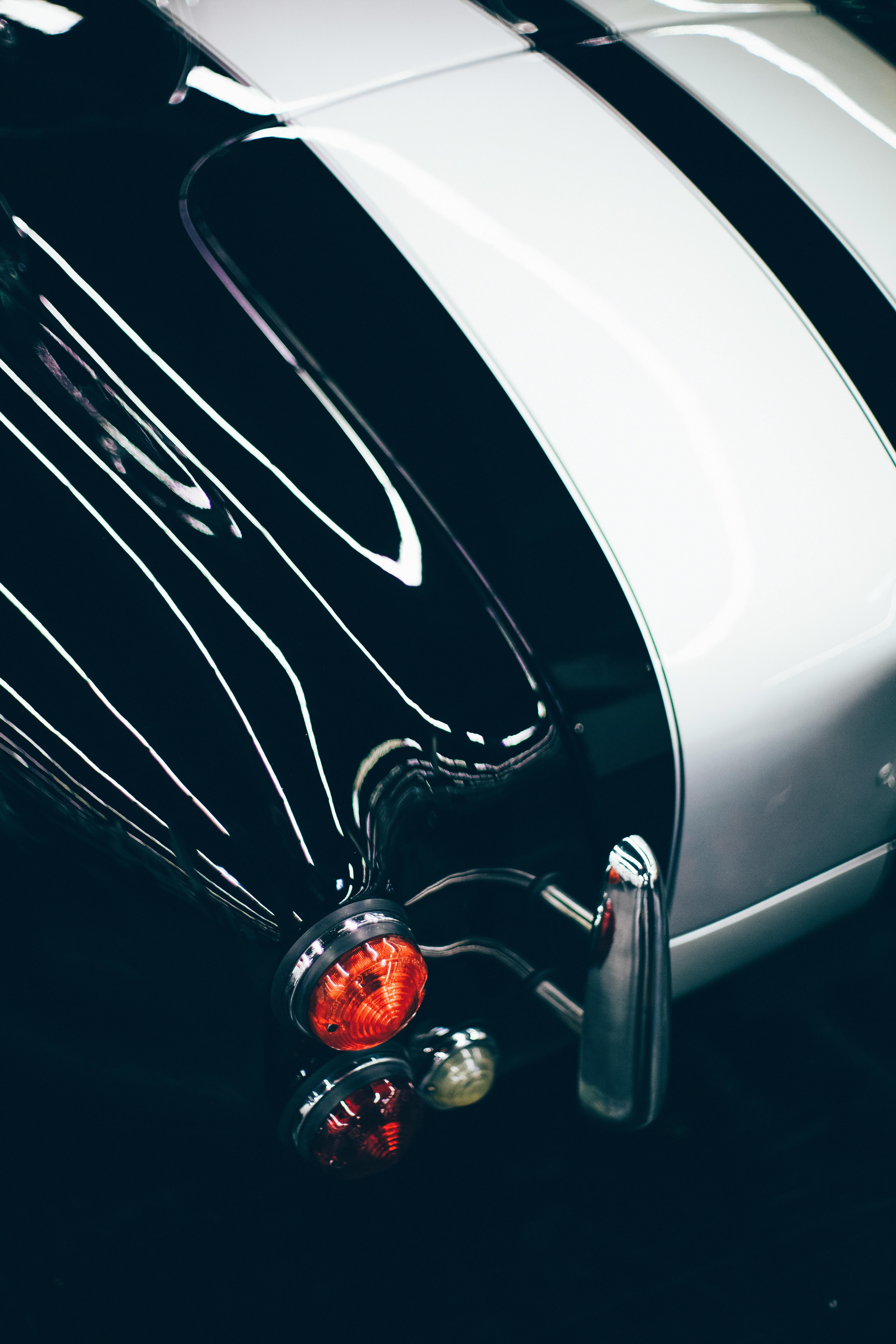 silver car with red and silver round ornament