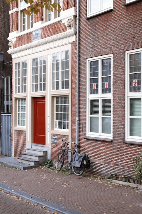 Foto profissional grátis de Amsterdã, bicicleta, casa