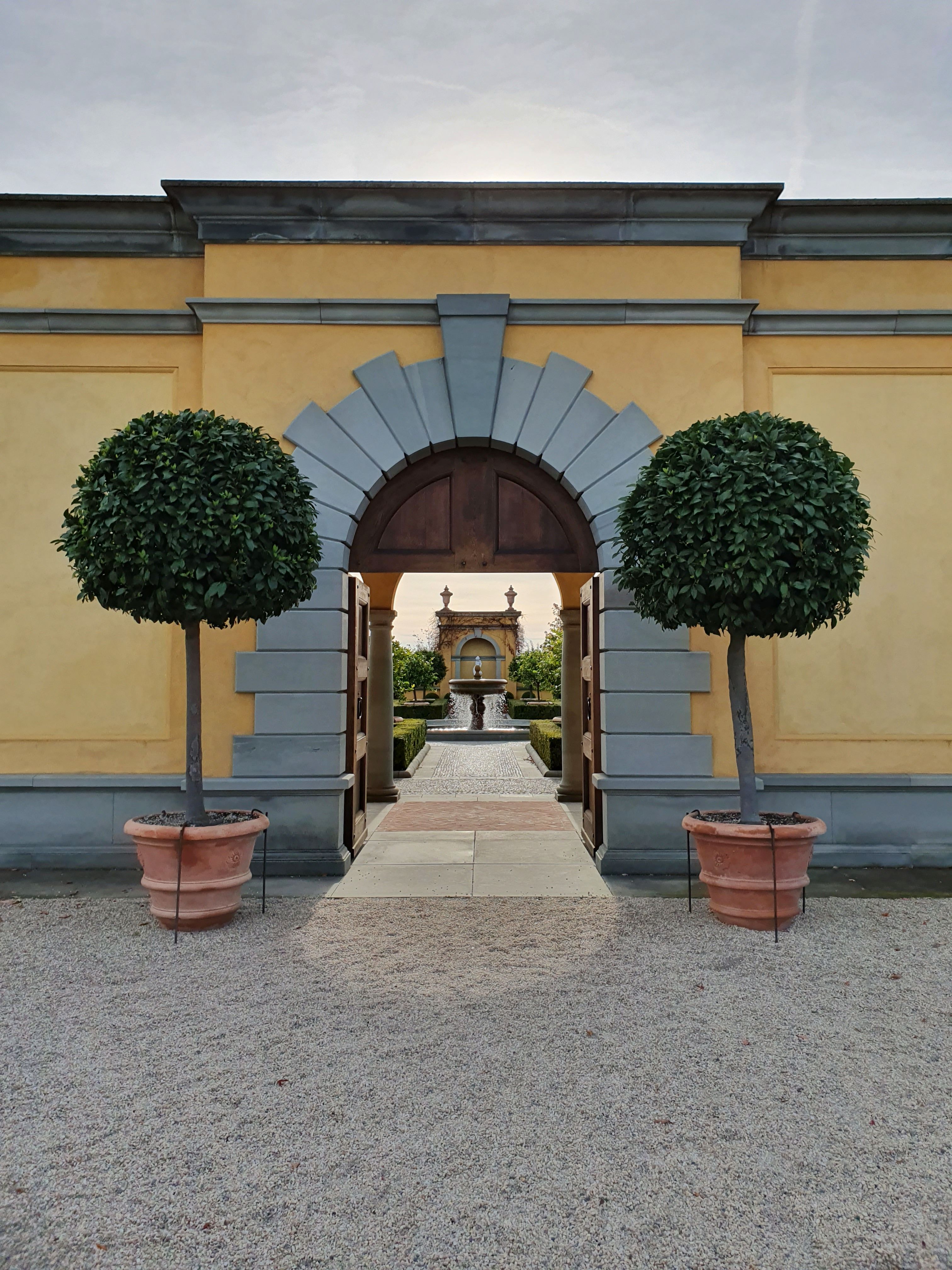Add Symmetrical Potted Plants