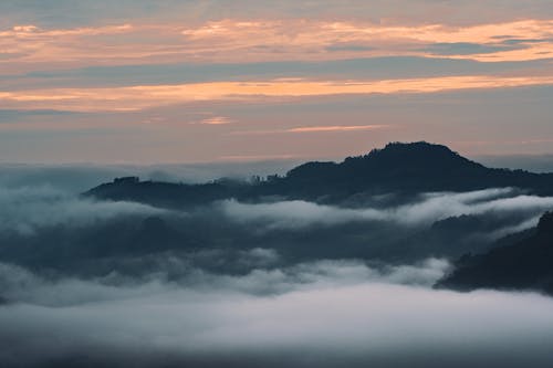 Gratis lagerfoto af appelsin, bjerge, bjergkæde