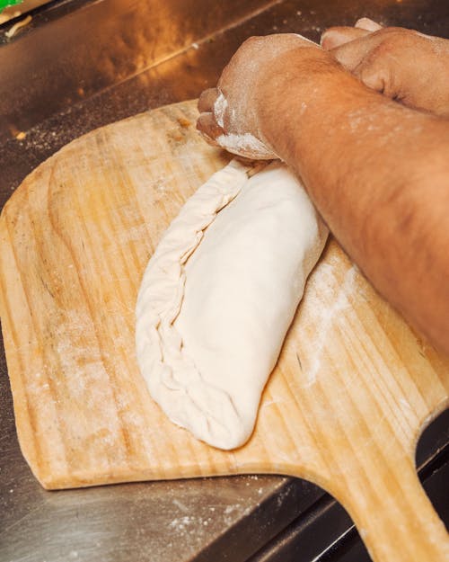 Woman Making Cake on a Tray 