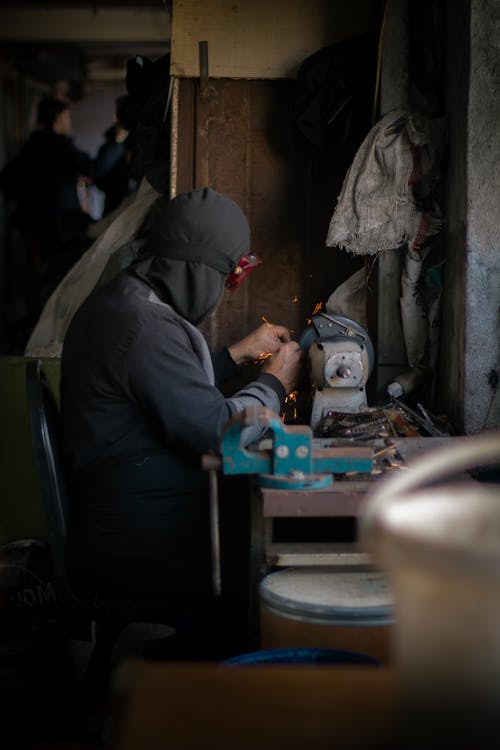An Artisan Working in a Workshop 
