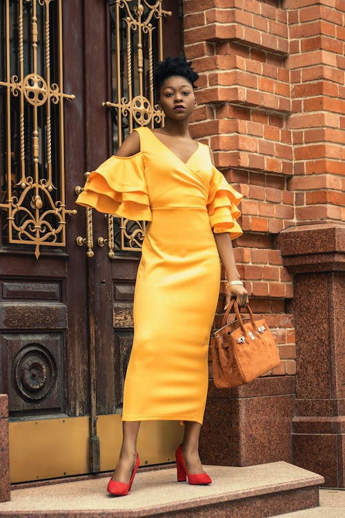 Woman Standing in Front of Door