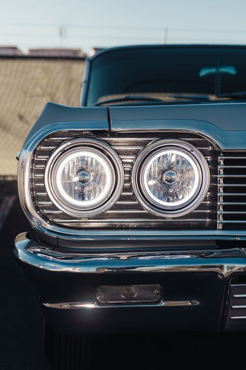 Round Headlights of a Clean Shiny Vintage Car