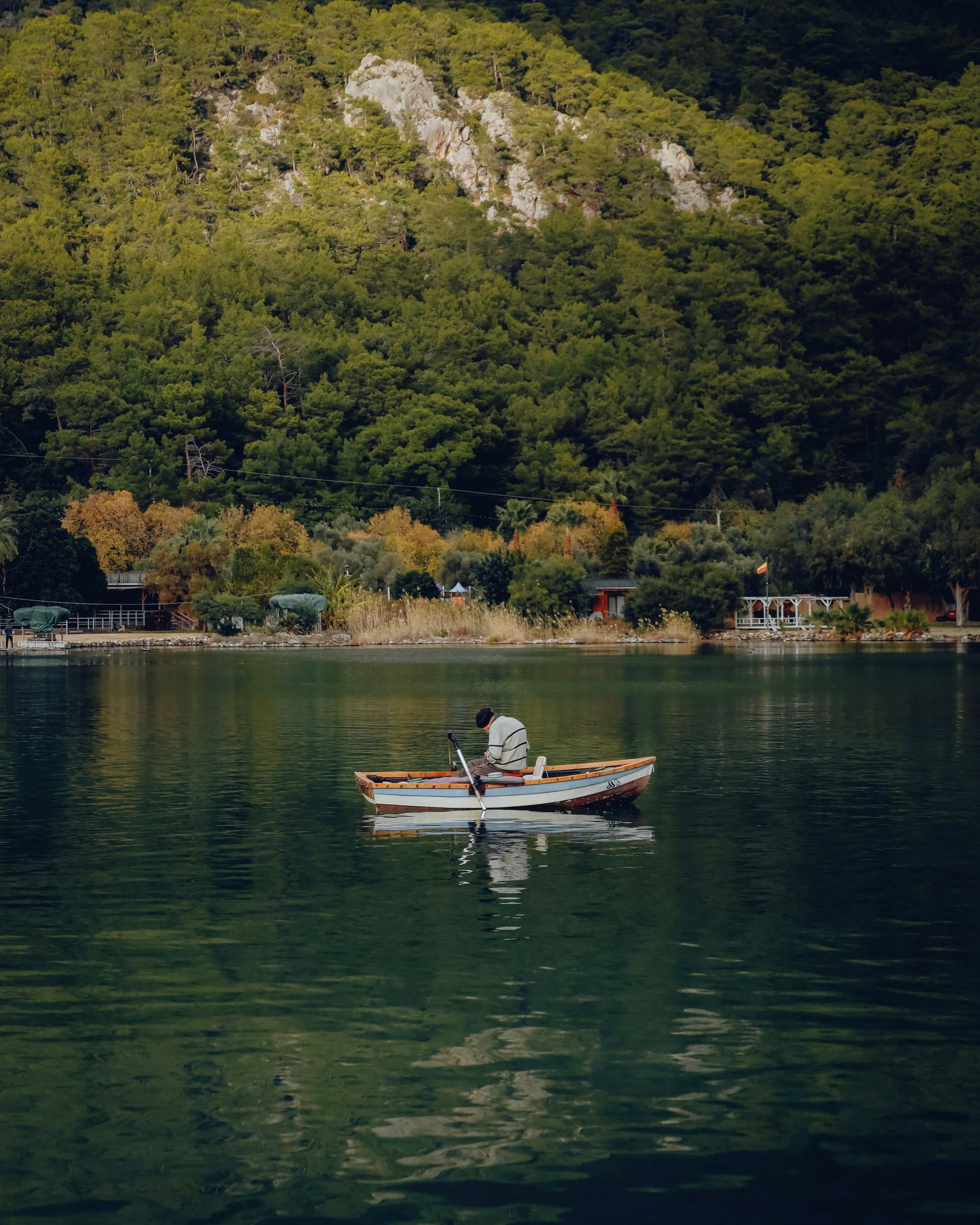 Man Riding a Rowing Boat on a Lake · Free Stock Photo