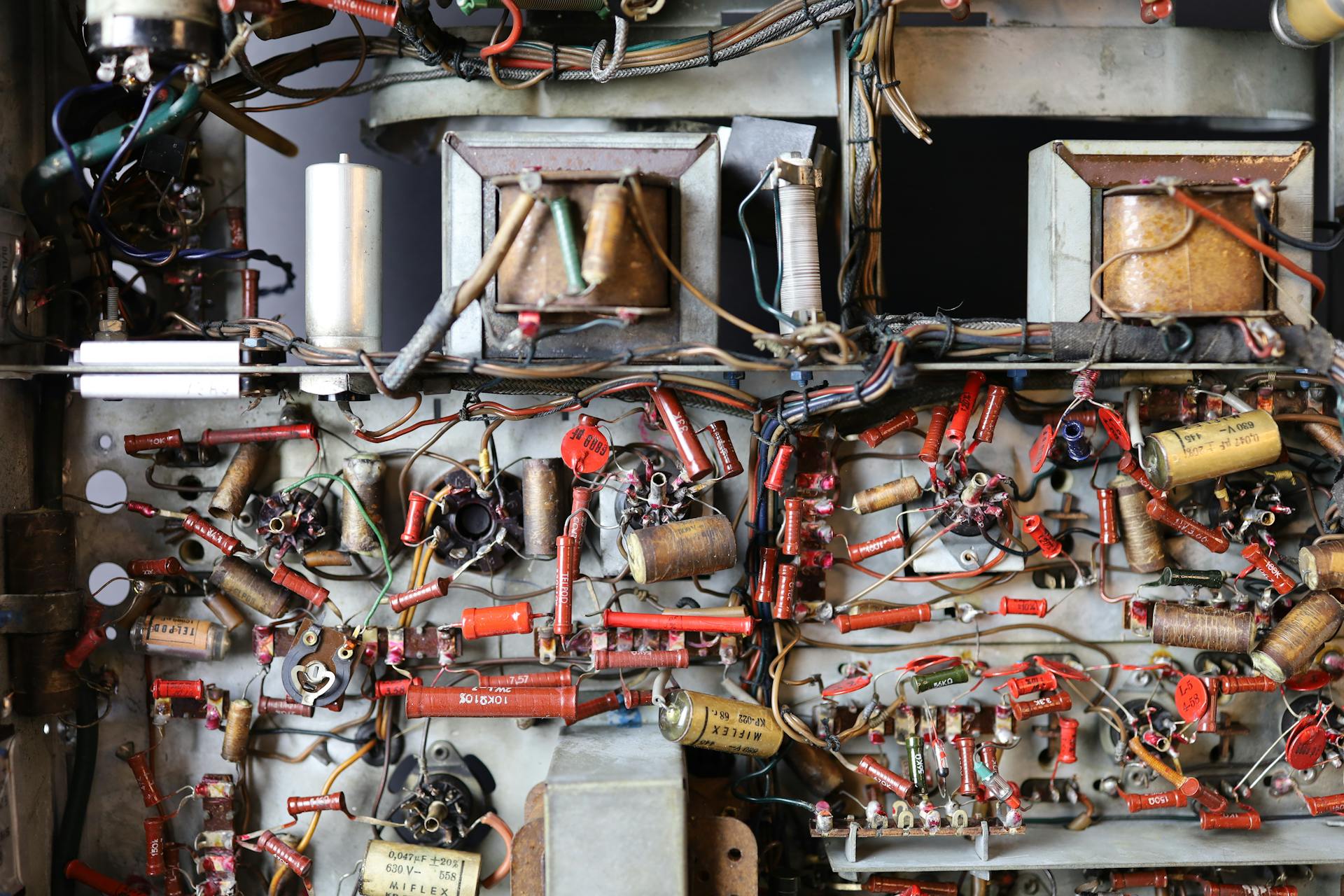 Detailed view of a retro electronics board with wires and components.