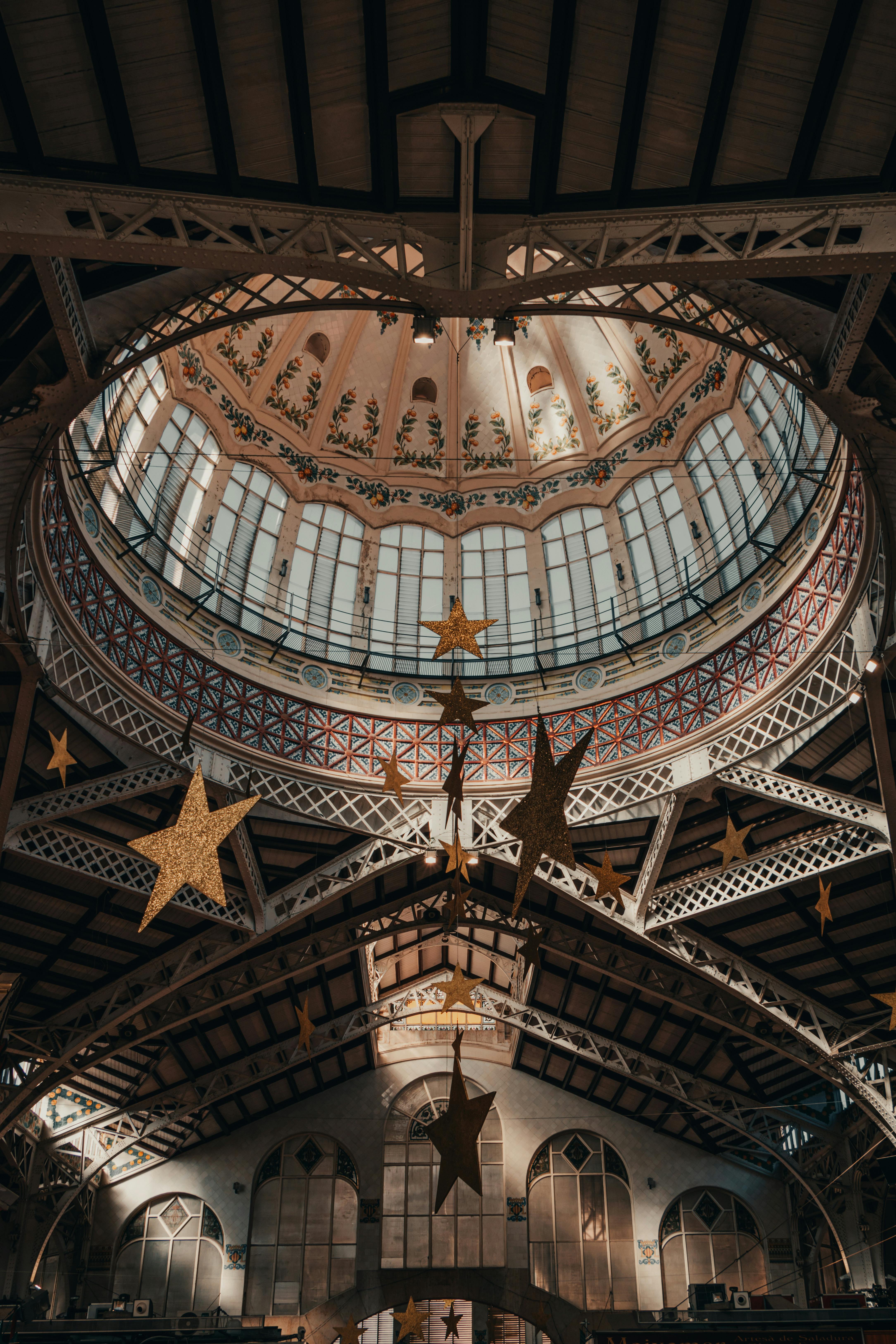 Captivating view of an ornate dome ceiling with star decorations and intricate architecture.
