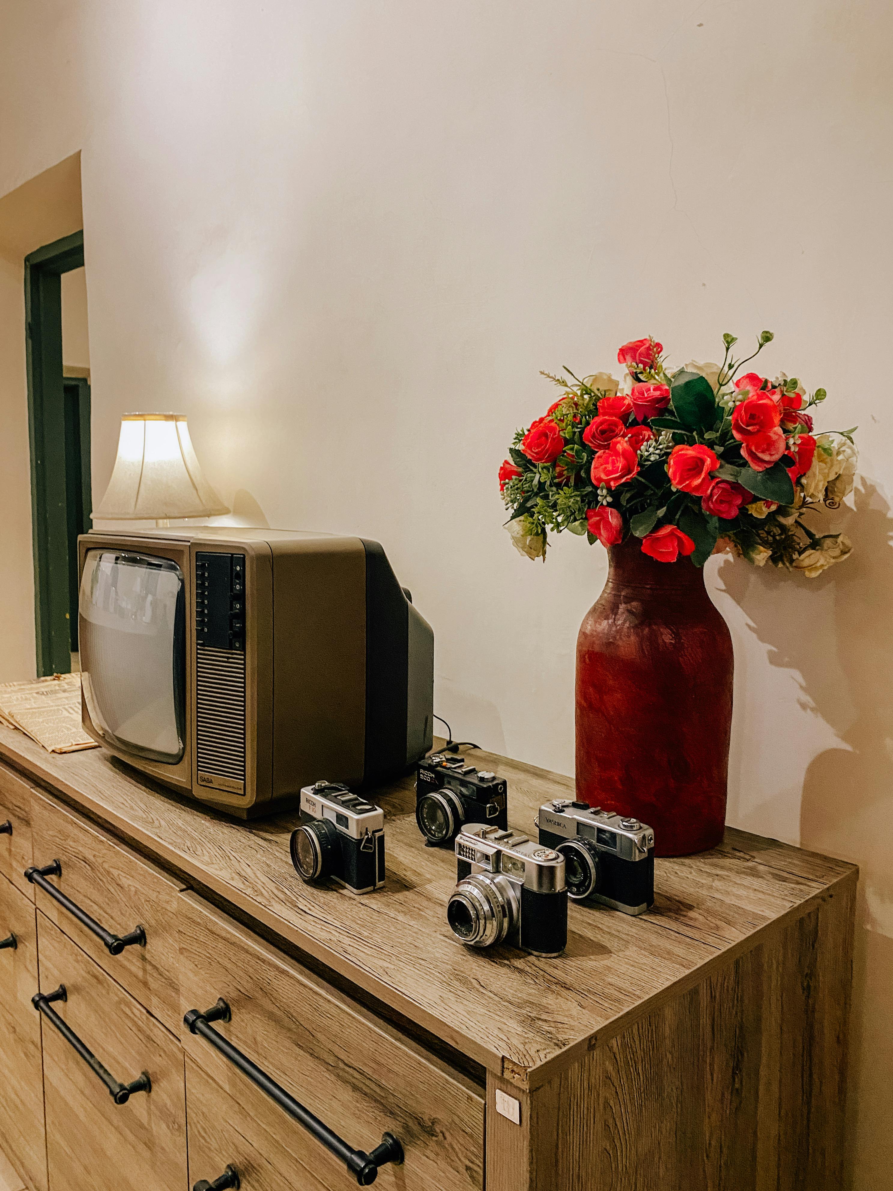 free photo of old camera and tv on the table