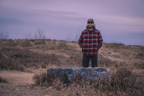 Man in a Red Plaid Shirt and Baseball Cap