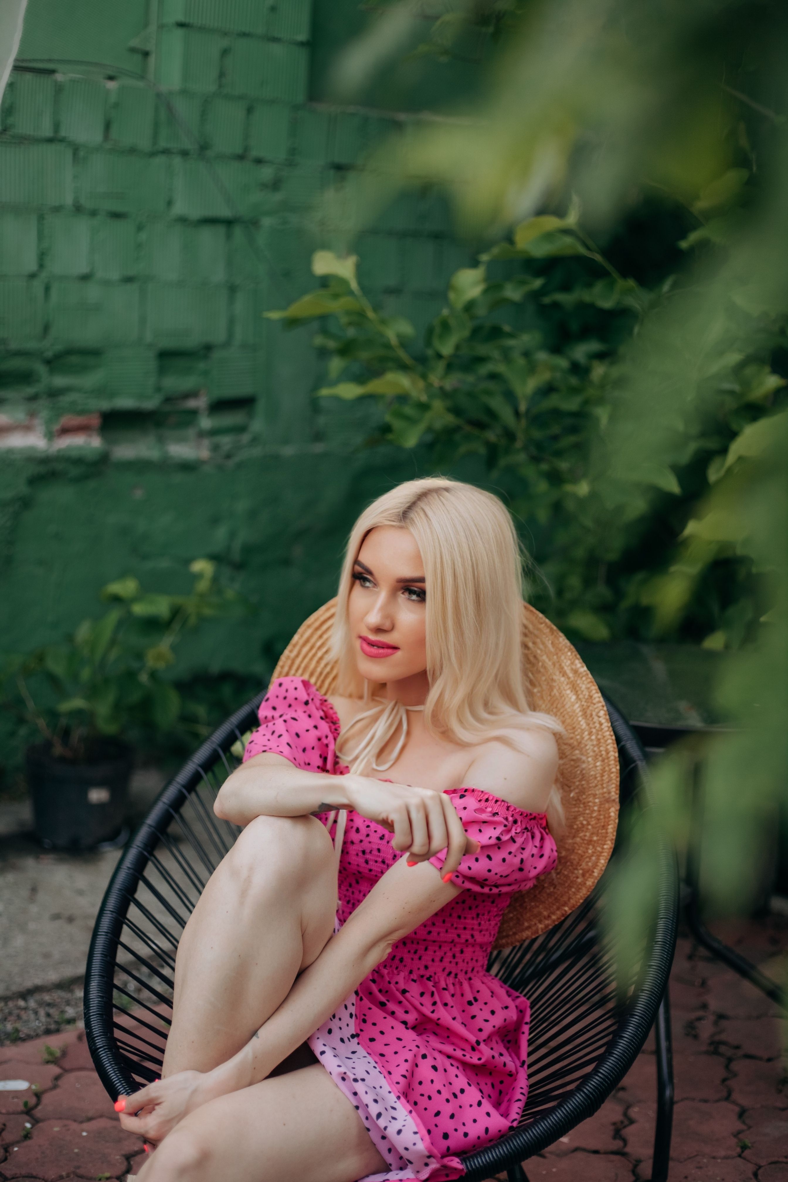 Blonde Woman in Pink Dress Sitting on Chair · Free Stock Photo