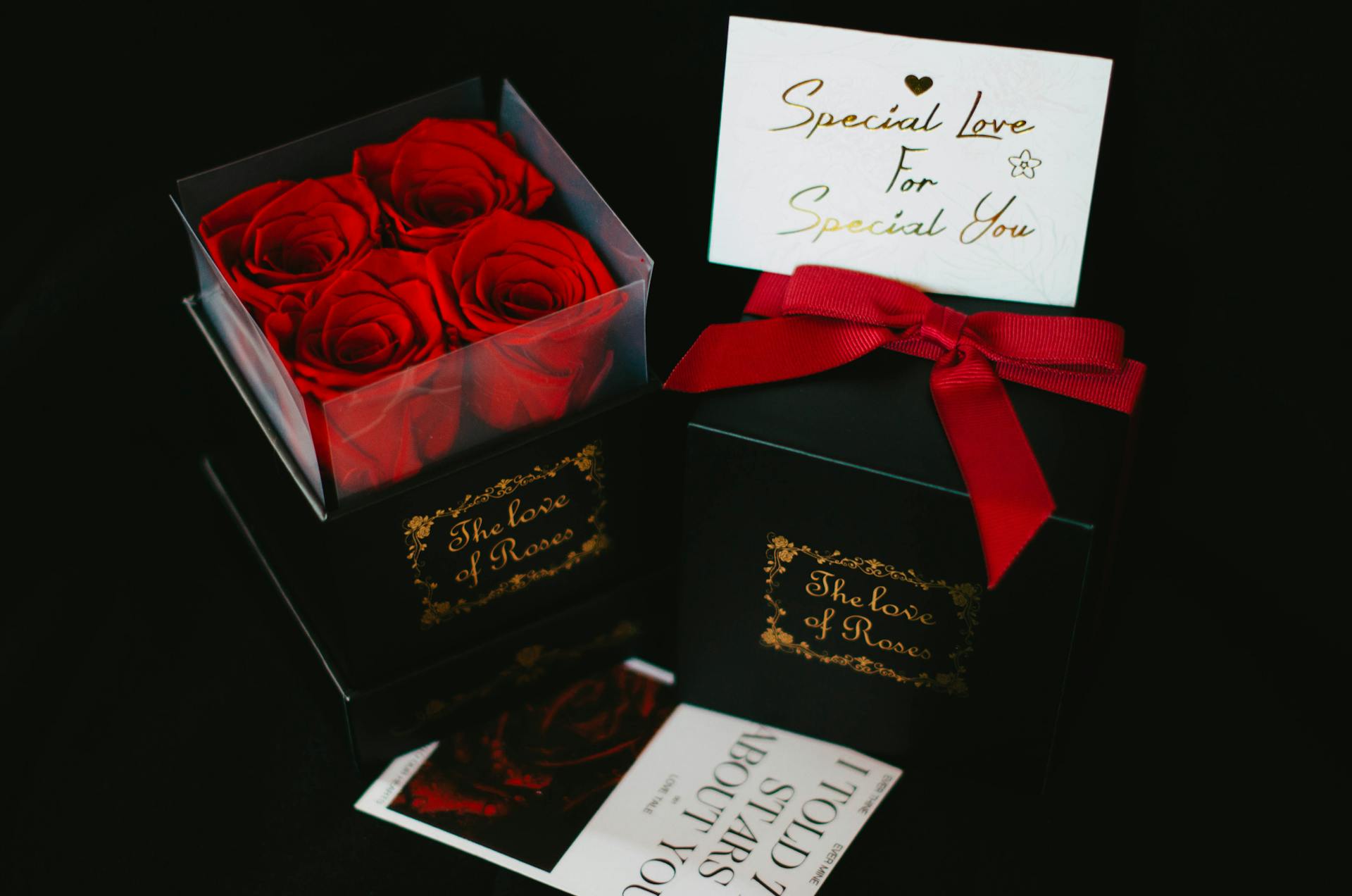 Luxurious red rose gift box complete with a special love card, perfect for celebrations.
