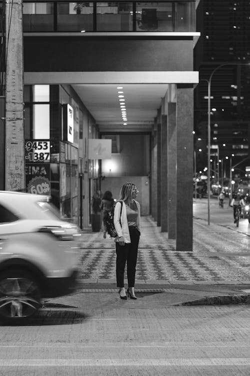 Woman on Street in Town in Black and White