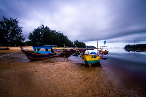 View of Boats Moored on the Shore 