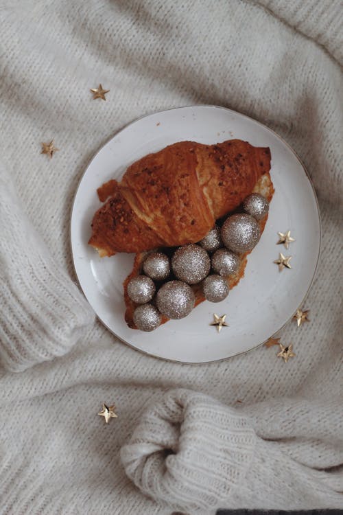 A Croissant with Christmas Baubles 